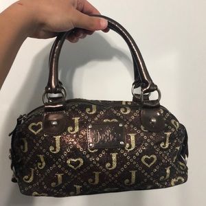 Justice Brown And Gold Bag